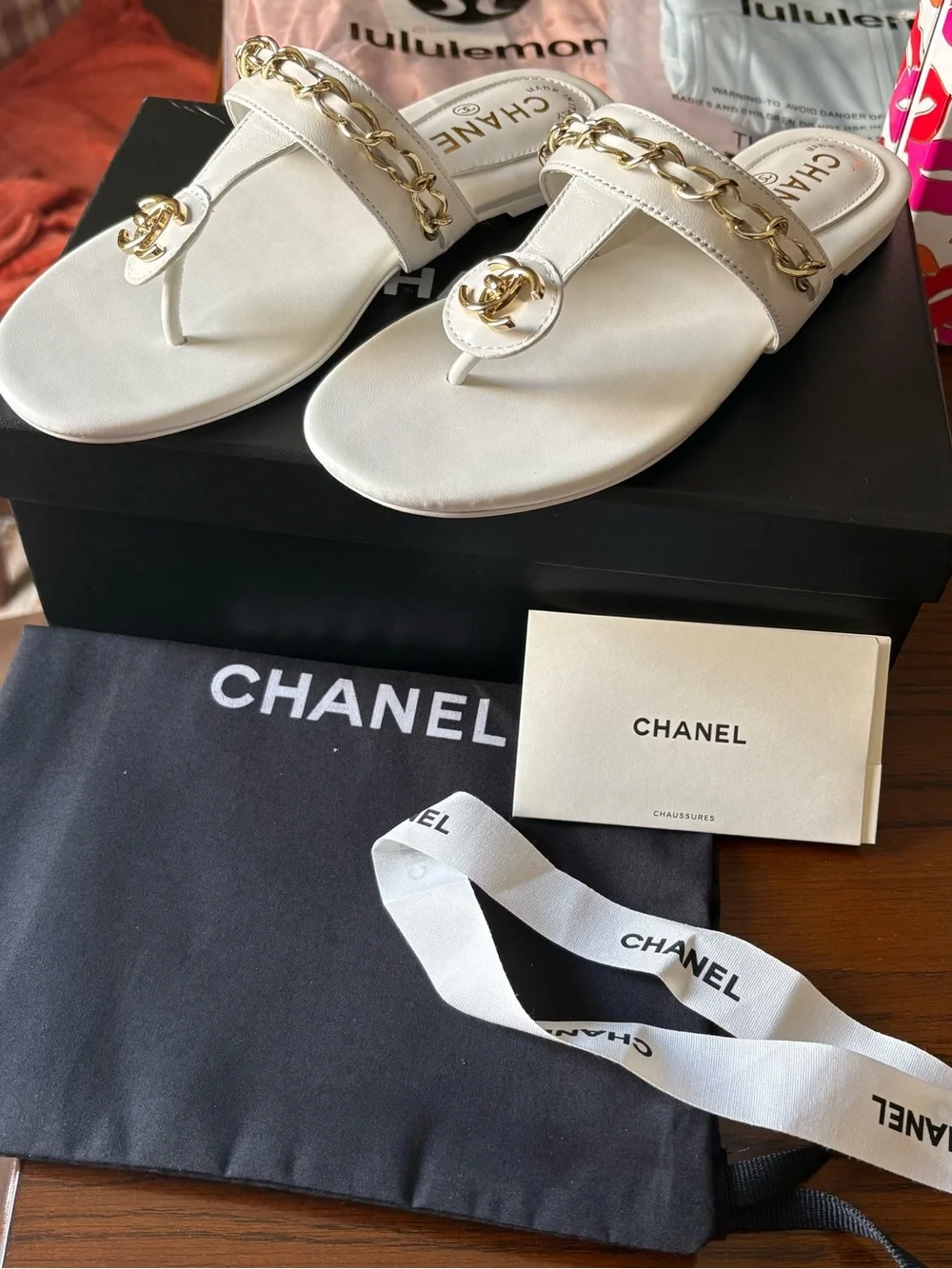CHANEL White Leather Thong Sandals with Gold Chain & CC Medallion